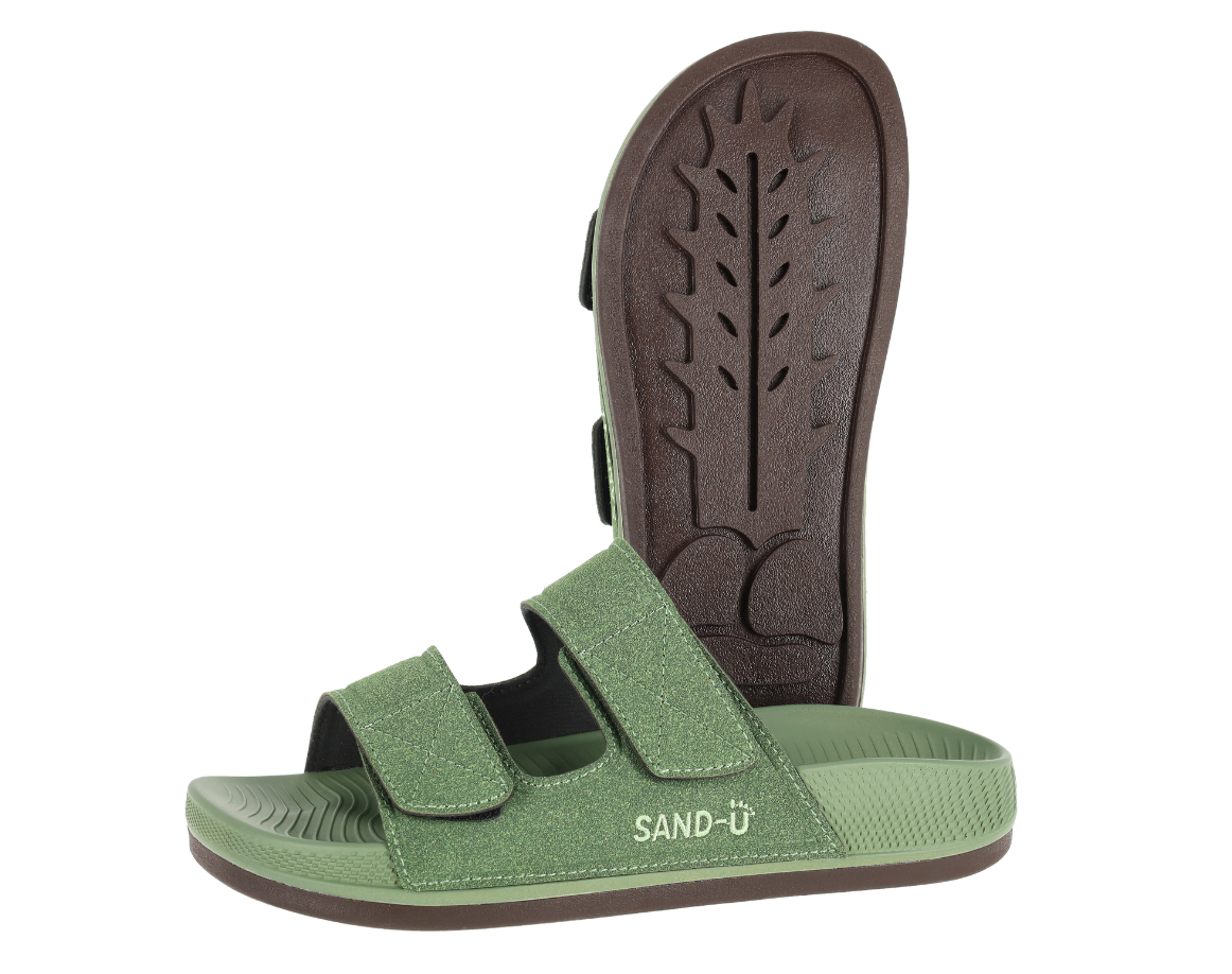 Green Sand-U sandals with brown cactus sole on a white background