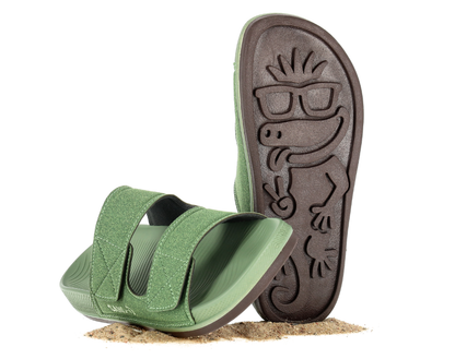 Green Sand-U sandals with brown lizard sole on a white background