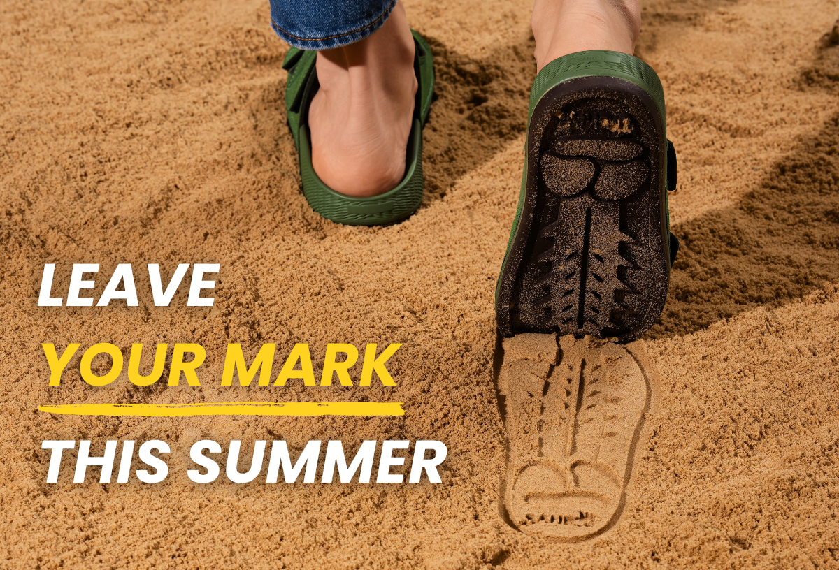 Sand-U Sandals leaving footprints in sand with visible cactus footprint and text 'Leave Your Mark This Summer'
